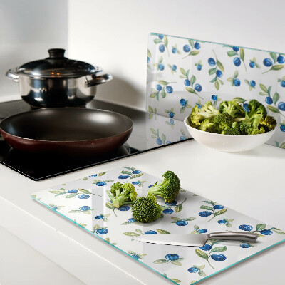 Glass chopping board Berries on the twigs