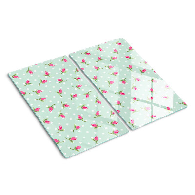 Glass kitchen board Pink tulips on a green background