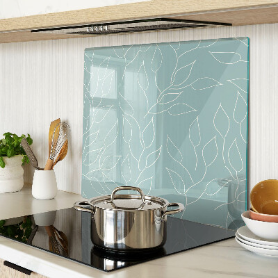Glass chopping board Leaves on the background