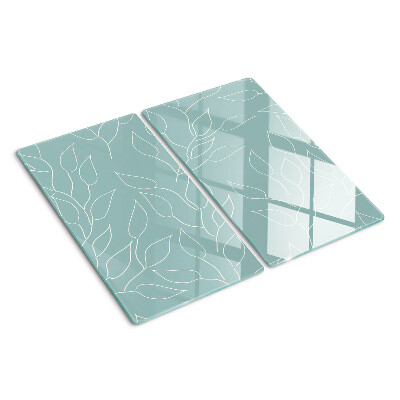 Glass chopping board Leaves on the background