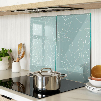 Glass chopping board Leaves on the background