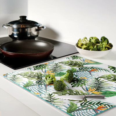 Glass kitchen board Tropical leaves and flowers