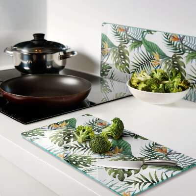 Glass kitchen board Tropical leaves and flowers