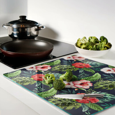 Glass kitchen board Tropical flowers with leaves