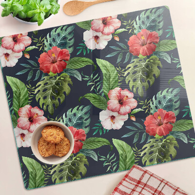 Glass kitchen board Tropical flowers with leaves