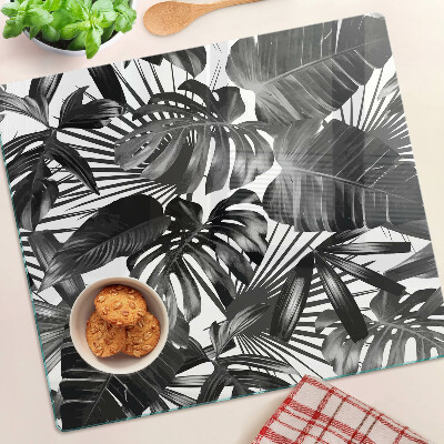 Glass kitchen board Tropical leaves in black and white