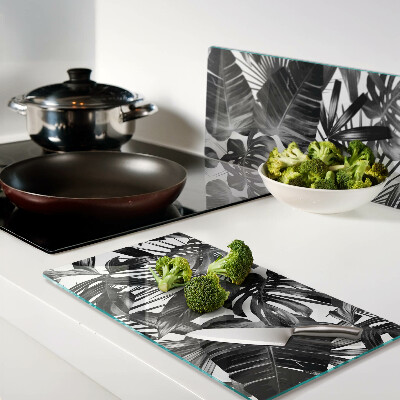 Glass kitchen board Tropical leaves in black and white