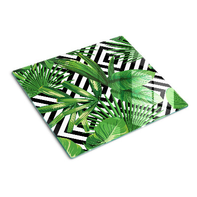 Glass kitchen board Tropical leaves on stripes