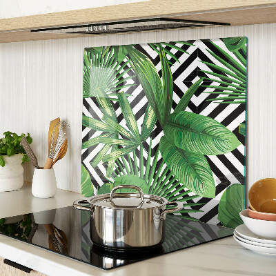 Glass kitchen board Tropical leaves on stripes