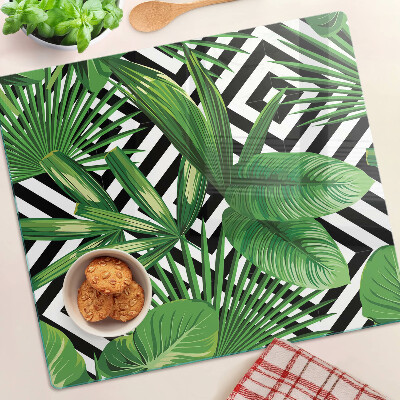 Glass kitchen board Tropical leaves on stripes