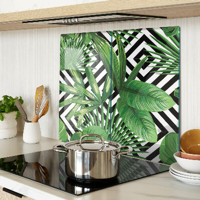 Glass kitchen board Tropical leaves on stripes