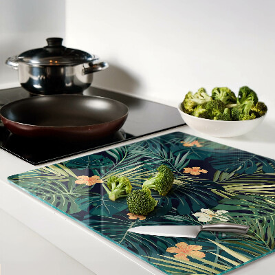 Glass kitchen board Tropical pattern with leaves and flowers