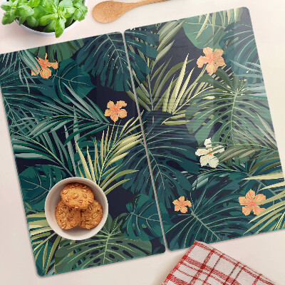 Glass kitchen board Tropical pattern with leaves and flowers