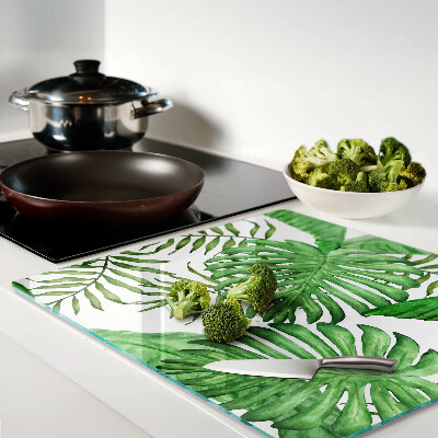 Glass kitchen board Tropical leaves in shades of green