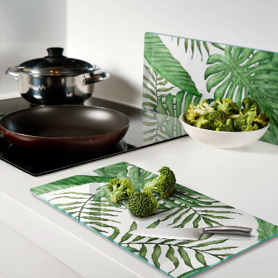 Glass kitchen board Tropical leaves in shades of green