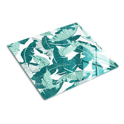 Glass kitchen board Tropical leaves in shades of green