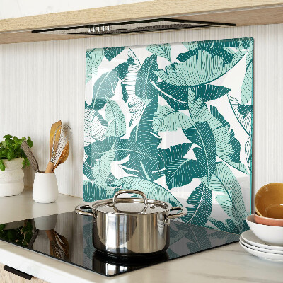Glass kitchen board Tropical leaves in shades of green