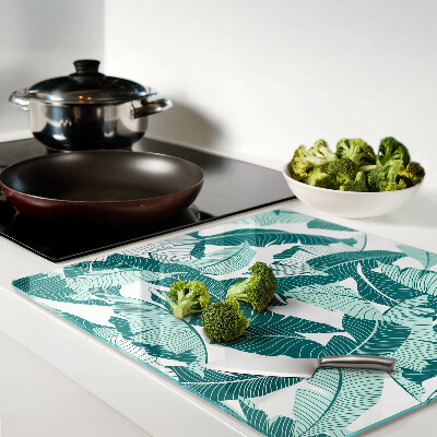 Glass kitchen board Tropical leaves in shades of green