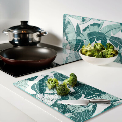 Glass kitchen board Tropical leaves in shades of green