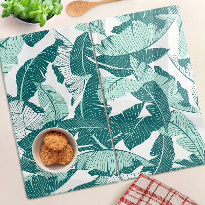 Glass kitchen board Tropical leaves in shades of green