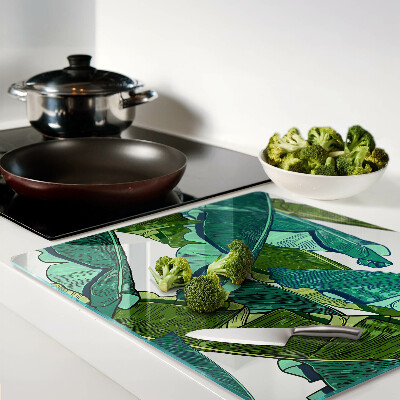 Glass kitchen board Palm leaves in shades of green
