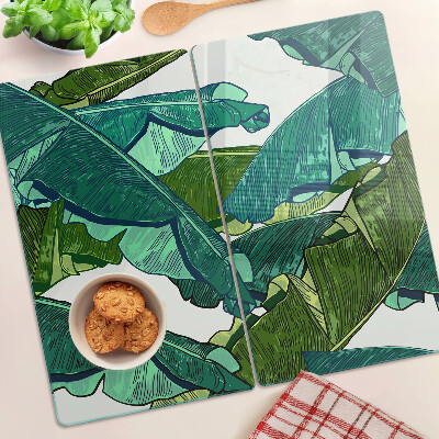 Glass kitchen board Palm leaves in shades of green