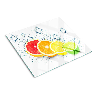 Glass kitchen board Citrus fruits in colorful slices