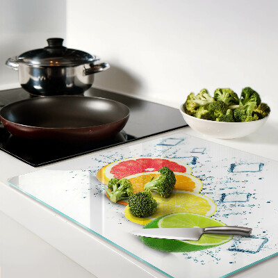 Glass kitchen board Citrus fruits in colorful slices