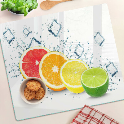 Glass kitchen board Citrus fruits in colorful slices