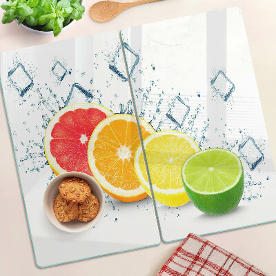 Glass kitchen board Citrus fruits in colorful slices
