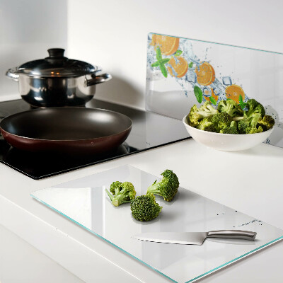 Glass chopping board Citrus in water