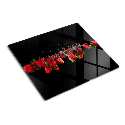 Glass chopping board Strawberries in water
