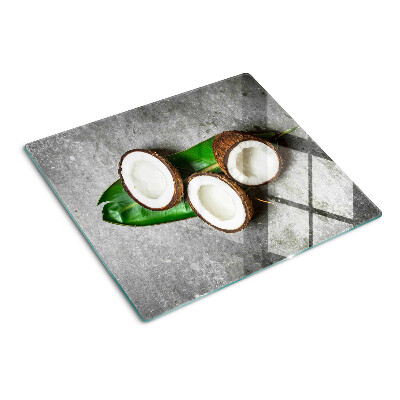 Glass kitchen board Coconut on concrete background