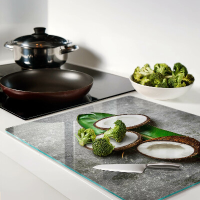 Glass kitchen board Coconut on concrete background