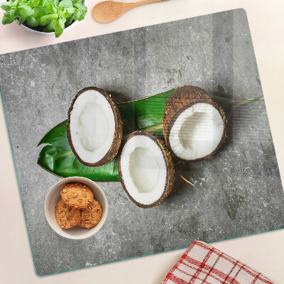 Glass kitchen board Coconut on concrete background