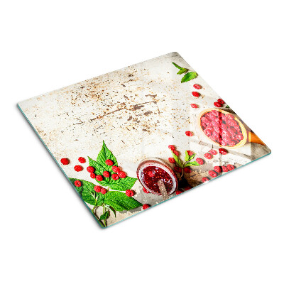 Glass kitchen board Raspberries and leaves
