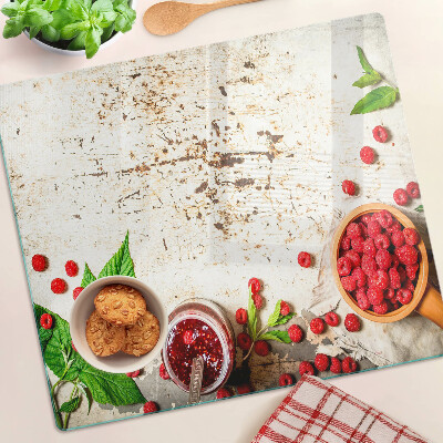 Glass kitchen board Raspberries and leaves