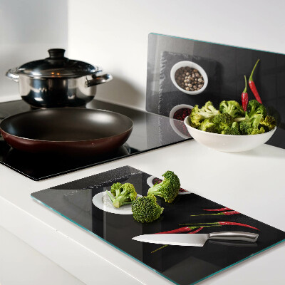 Glass chopping board Spices and red peppers