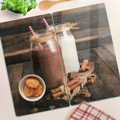 Glass kitchen board Jars with drinks on a wooden background