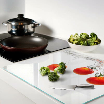 Glass kitchen board Tomatoes in water