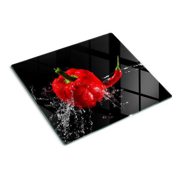 Glass kitchen board Red pepper in water