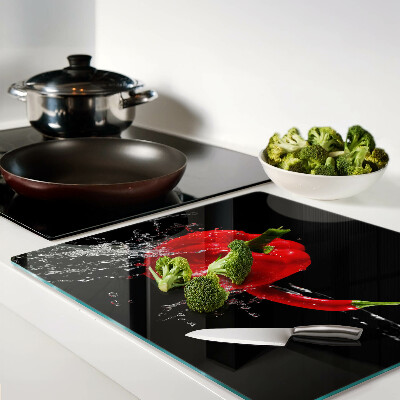 Glass kitchen board Red pepper in water