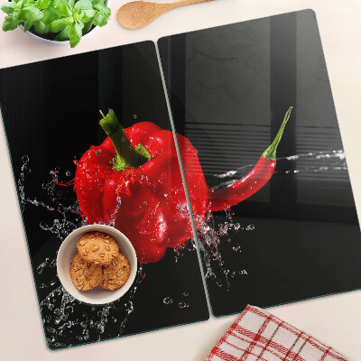 Glass kitchen board Red pepper in water