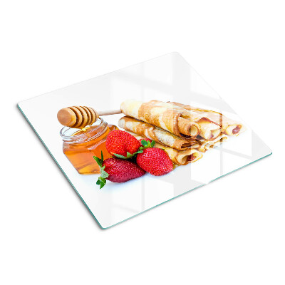 Glass kitchen board Pancakes with honey and strawberries
