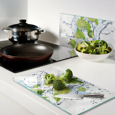 Glass chopping board Lemons in water