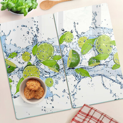 Glass chopping board Lemons in water