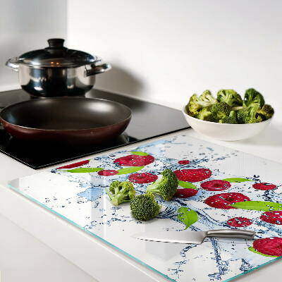 Glass chopping board Fruit in water