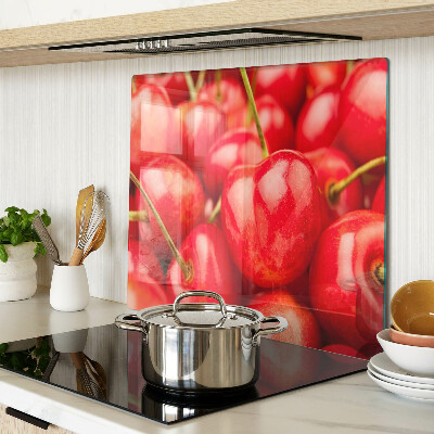 Glass kitchen board Cherries on a red background