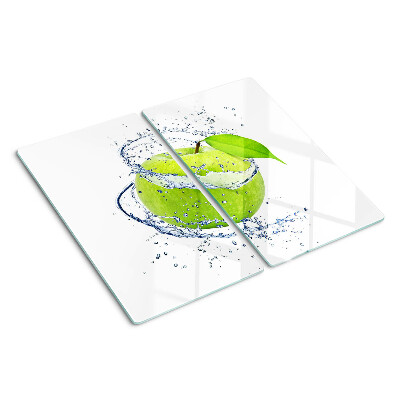 Glass chopping board Apple in water