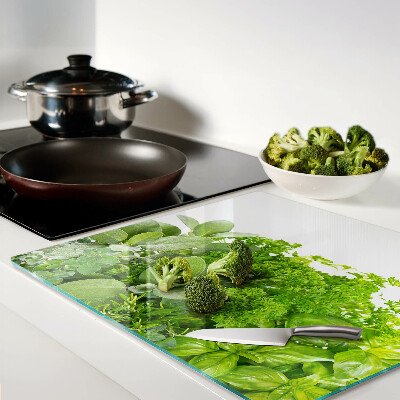 Glass chopping board Green herbs and leaves